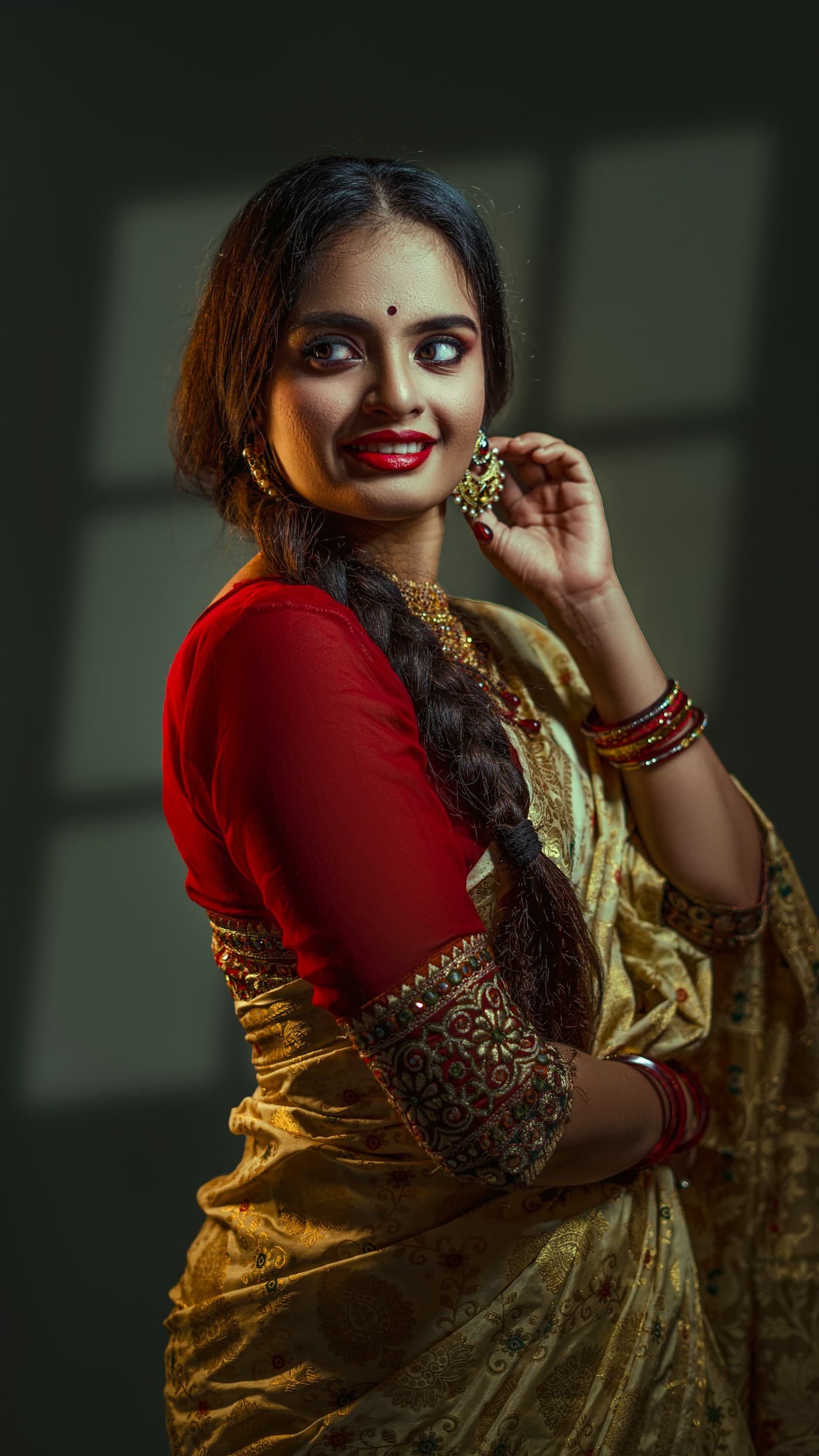 Indian fashion portrait in dramatic editorial light